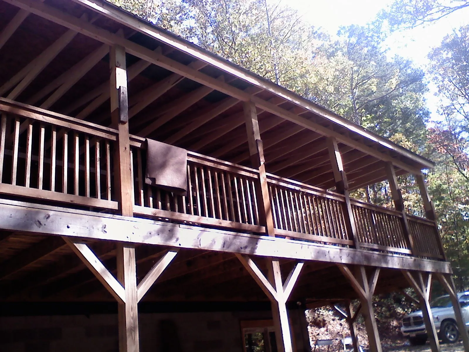 Timber framing under a new elevated porch and deck — Roof Leak Repair in Shambaugh by Roofing Brothers
